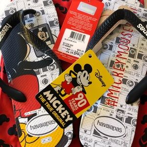 New!  Never worn with tags Size 8 Mickey Mouse flip flops with bag